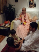 Keshav and Isha helping with foot massage.jpg